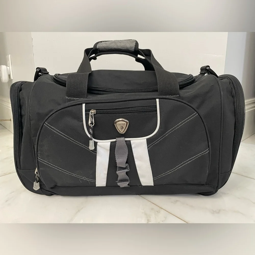 Calpak black canvas multi-pocket dual strap duffel bag travel luggage gym