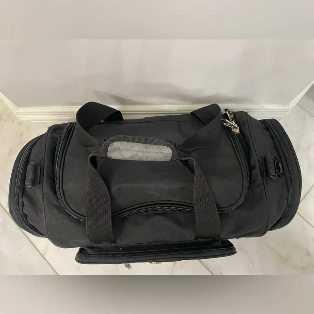 Calpak black canvas multi-pocket dual strap duffel bag travel luggage gym