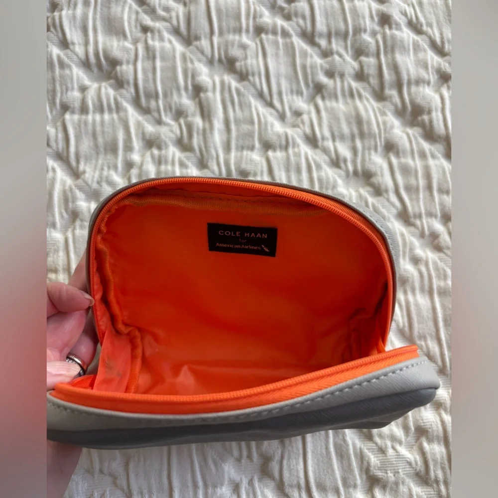 AMERICAN AIRLINES Cole Haan grey/orange amenity kit bag‎ -cosmetic travel holder