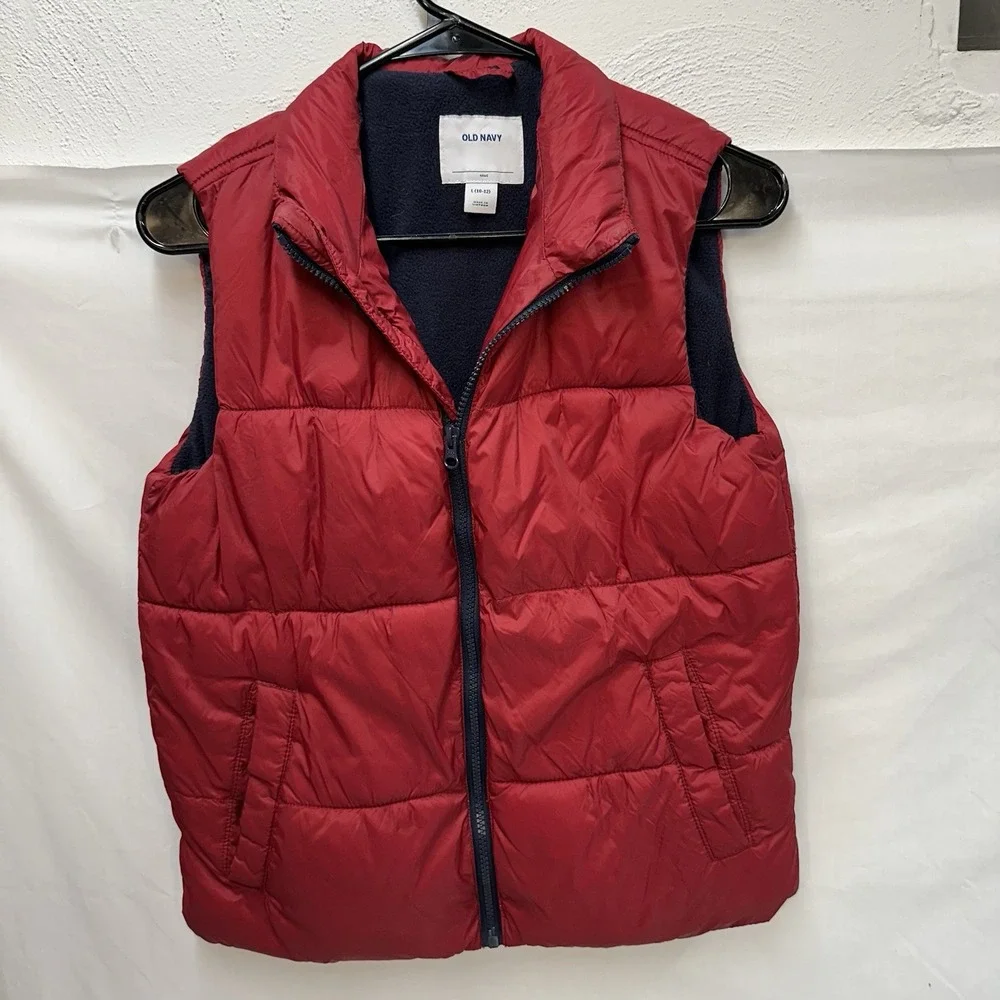 Old Navy Water-Resistant Puffer Vest Youth L Red with blue fleece‎ lining.