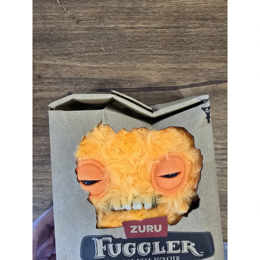 Fuggler damaged box new