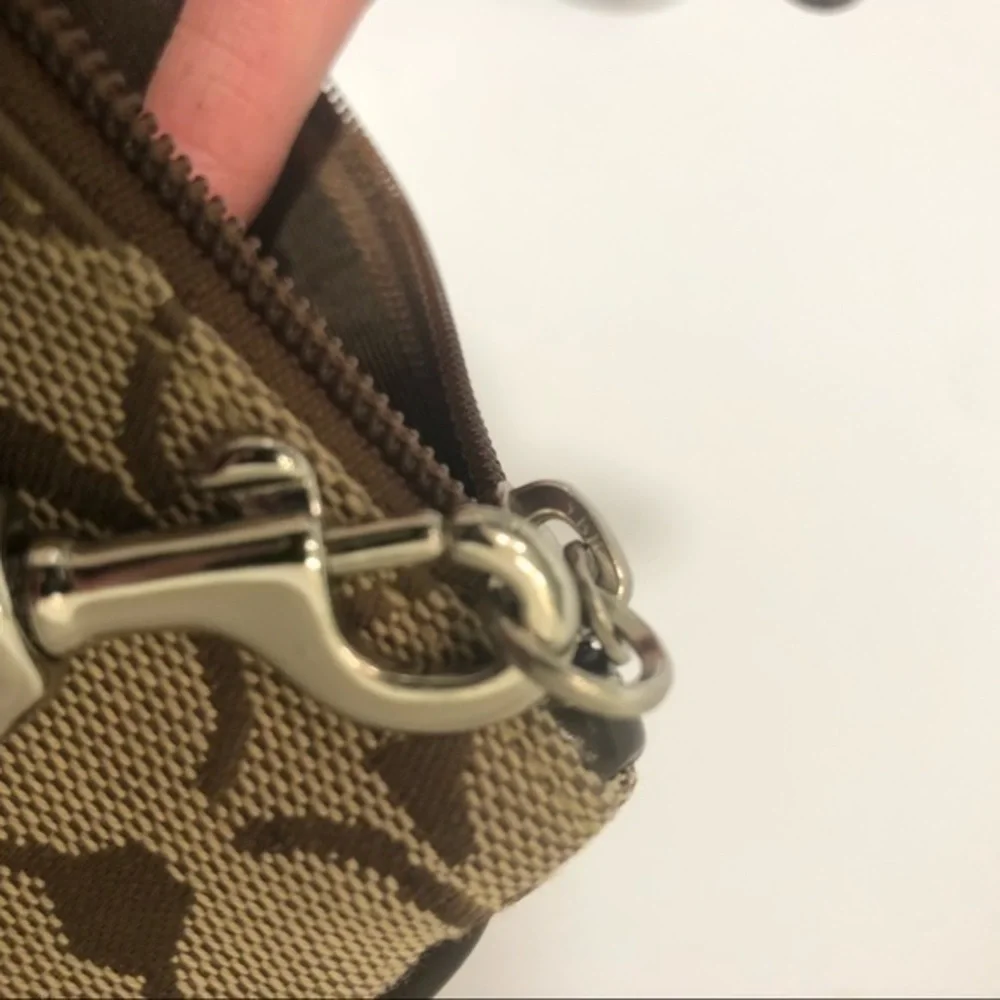 Coach brown signature striker wristlet