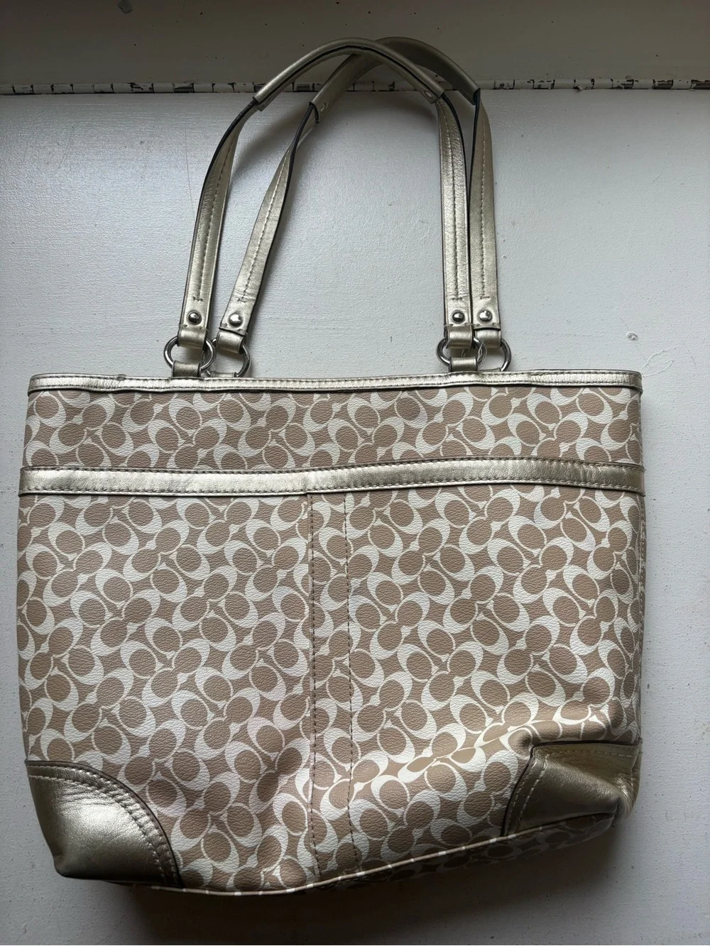 Coach tote featuring