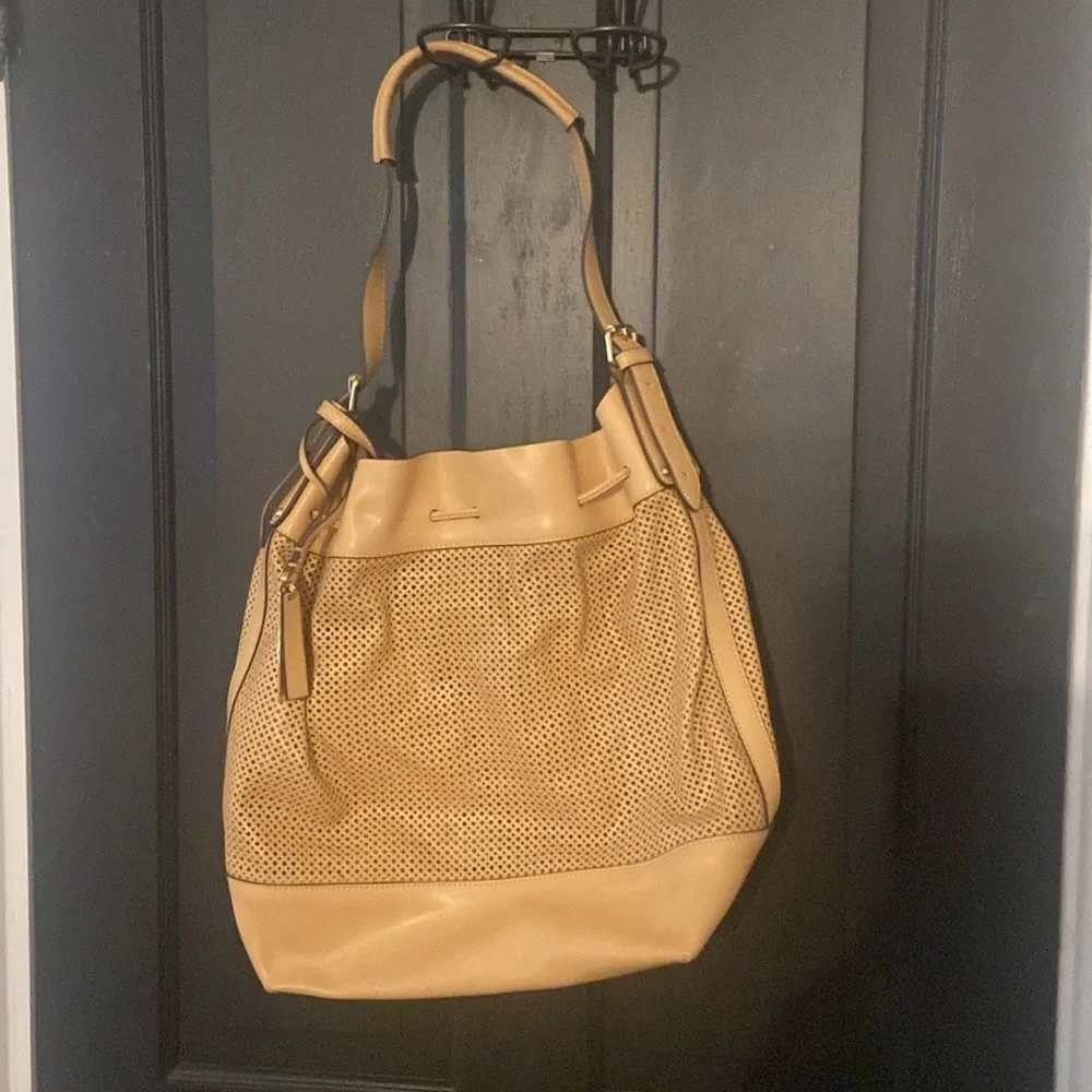 Vince Camuto this perforated