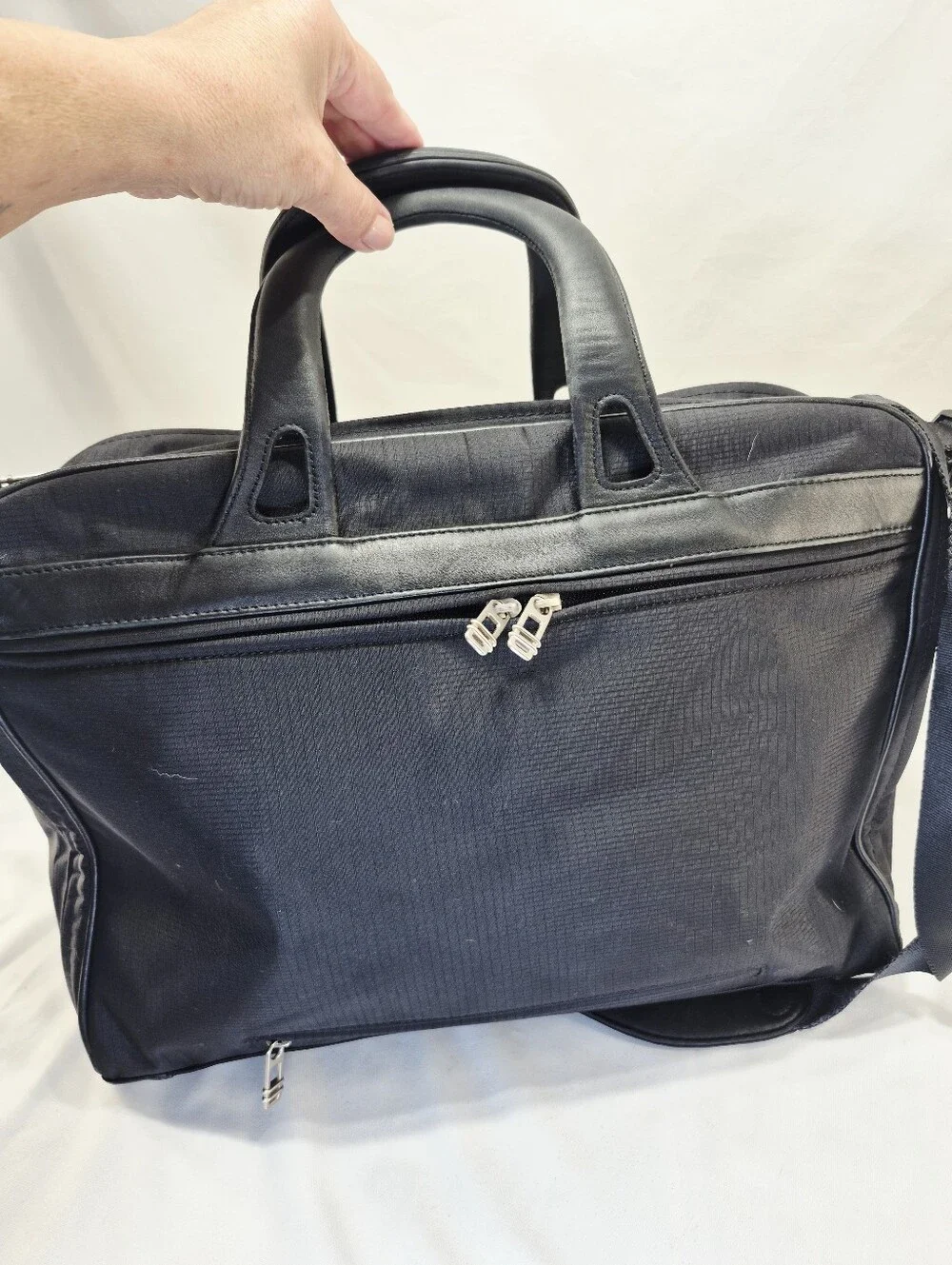 Tumi spots wear