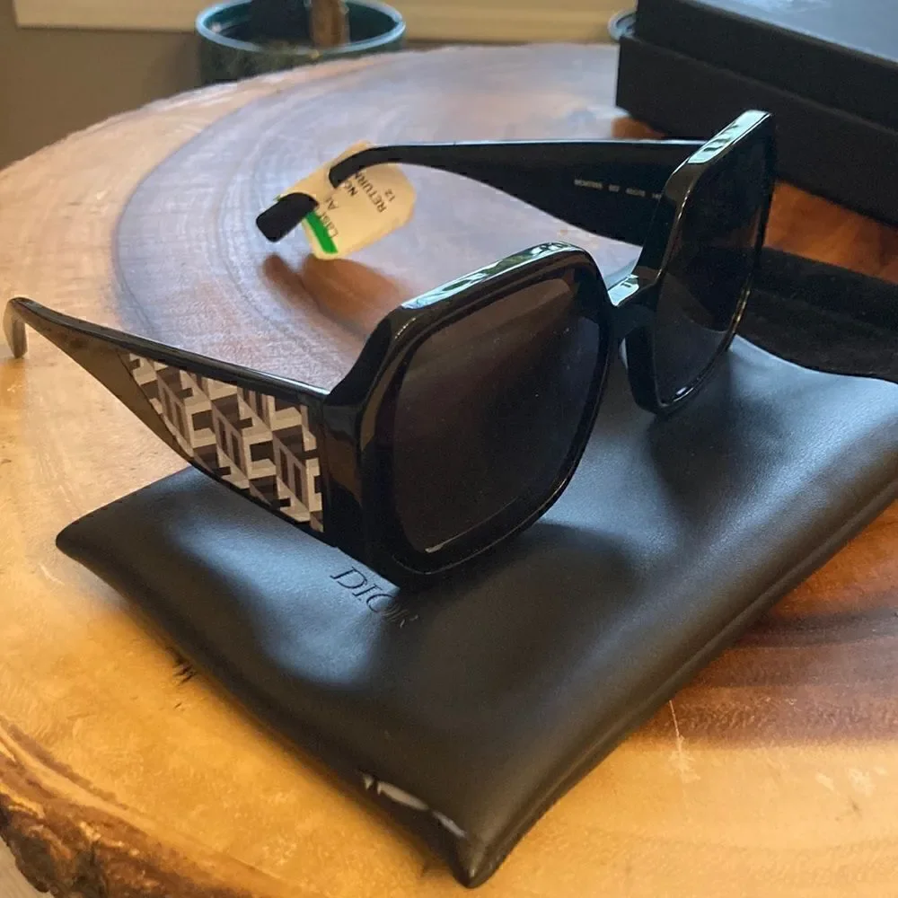 MCM NEW MCM 709S 002 Black Sunglasses With Anniversary Print On Temple