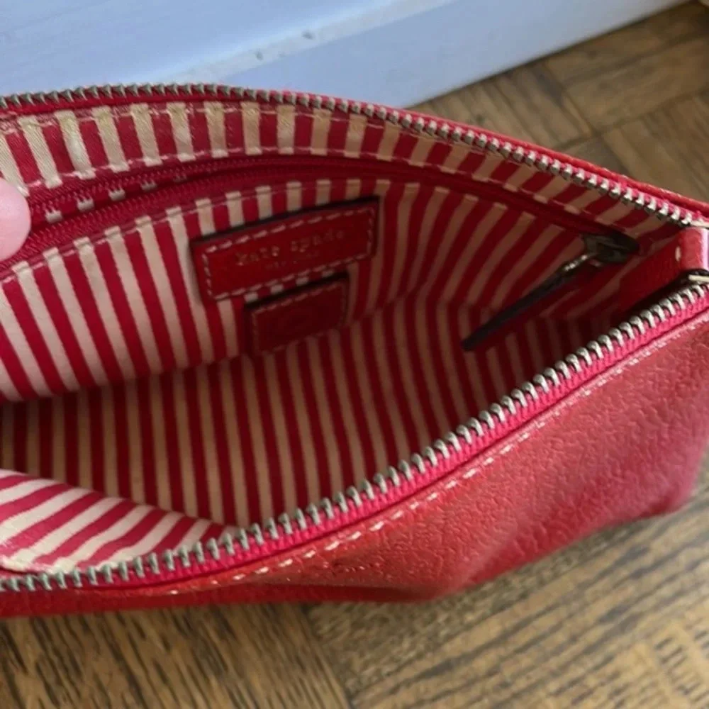 Kate Spade red pebbled leather wristlet bag
