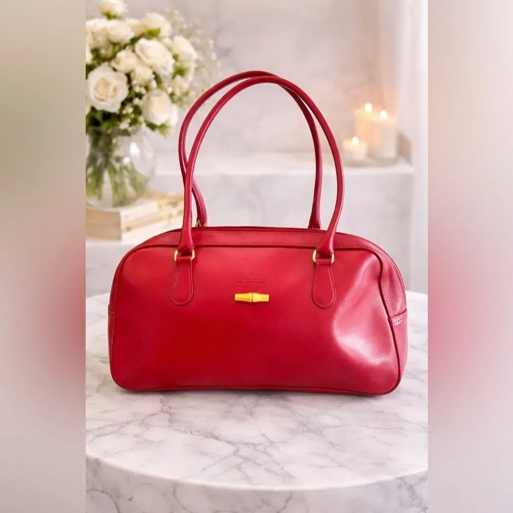Vintage Longchamp Roseau Leather Bag in the color Bordeaux.
