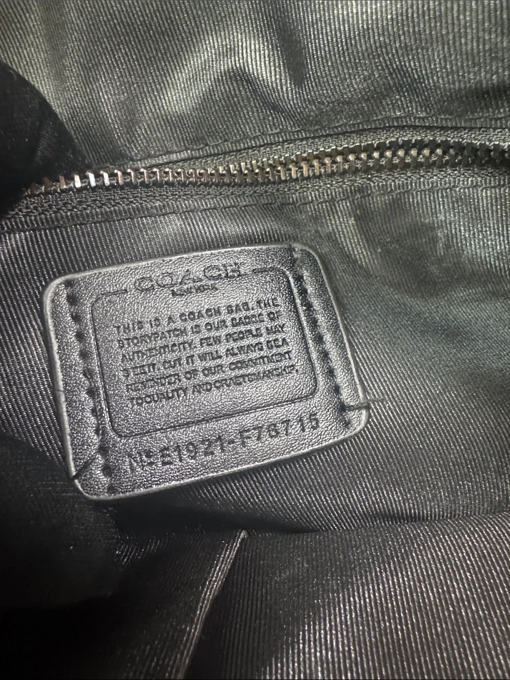 Coach briefcase signature