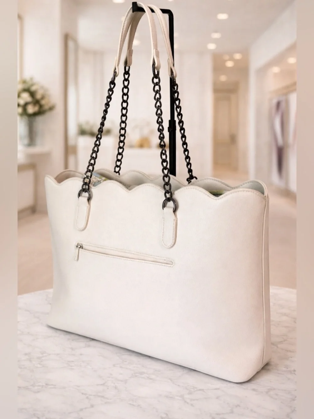 Betsey Johnson cream-colored tote bag black chain straps and heart-shaped charm