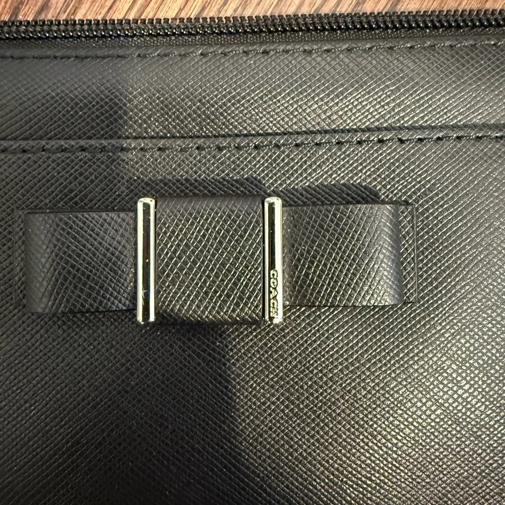 Coach black bow