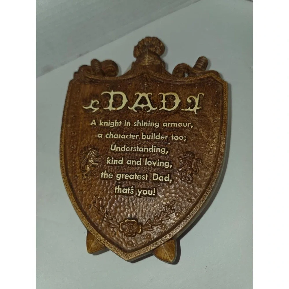 vintage faux wood composite shield-shaped wall plaque featuring a 