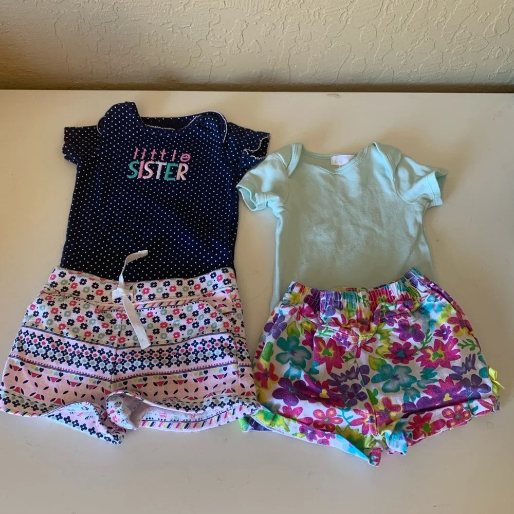 Carter’s bundle of 4 infant girl clothing