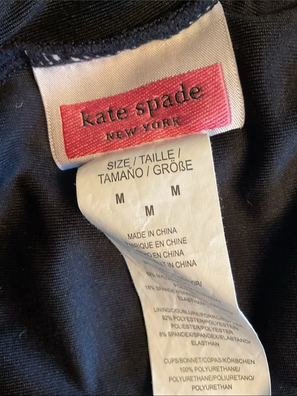 kate spade slim kate zipper