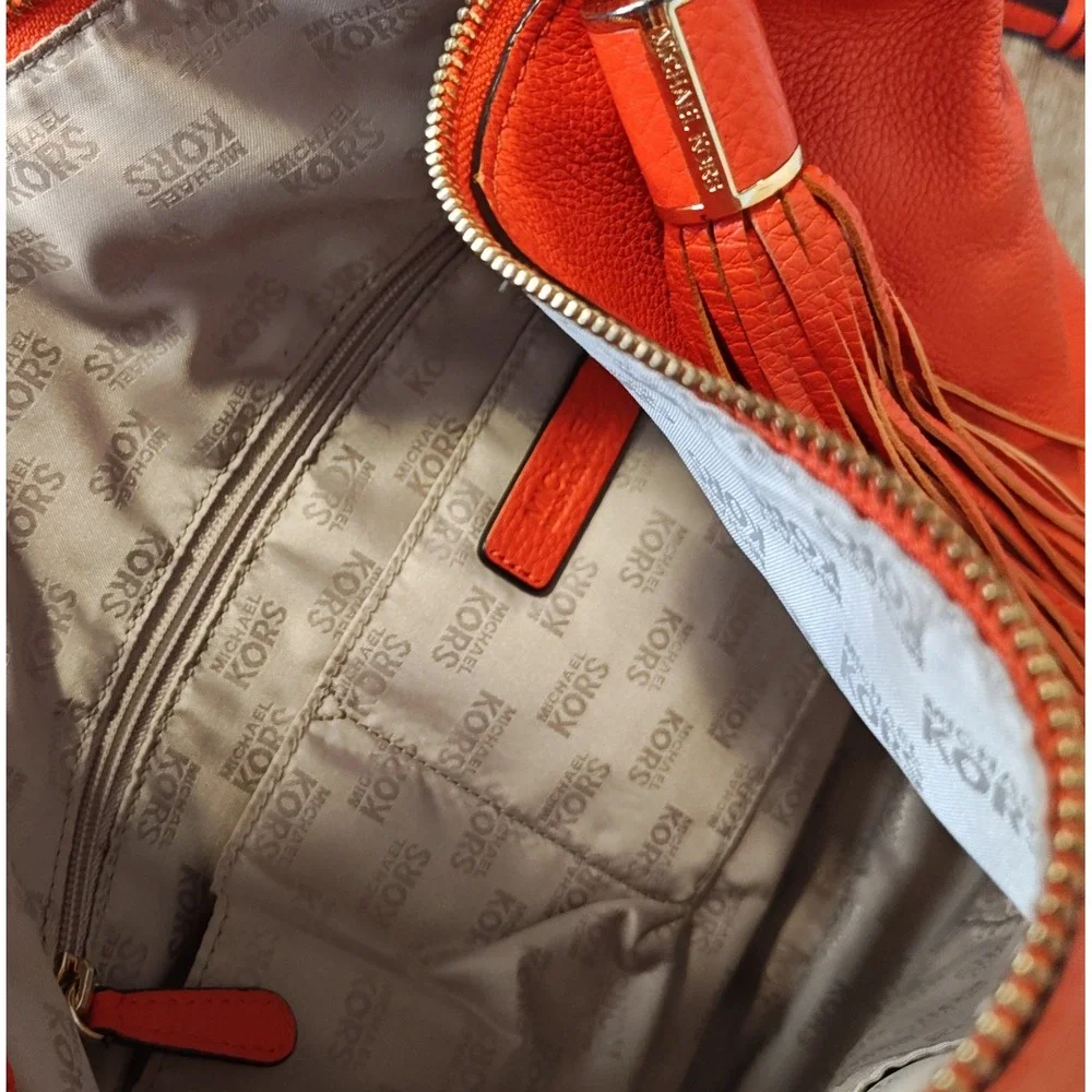 Michael Kors Hobo Crossbody Bag Womens Large Orange Pebbled Leather Tassel Gold