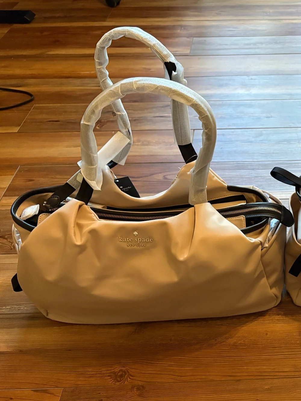 kate spade beige nylon diaper bag or duffel bag.