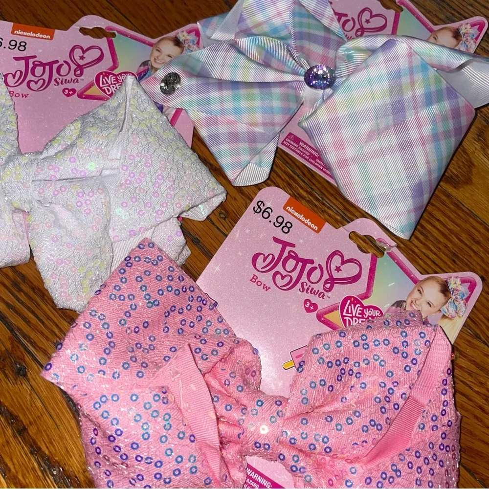 JoJo Siwa three playful