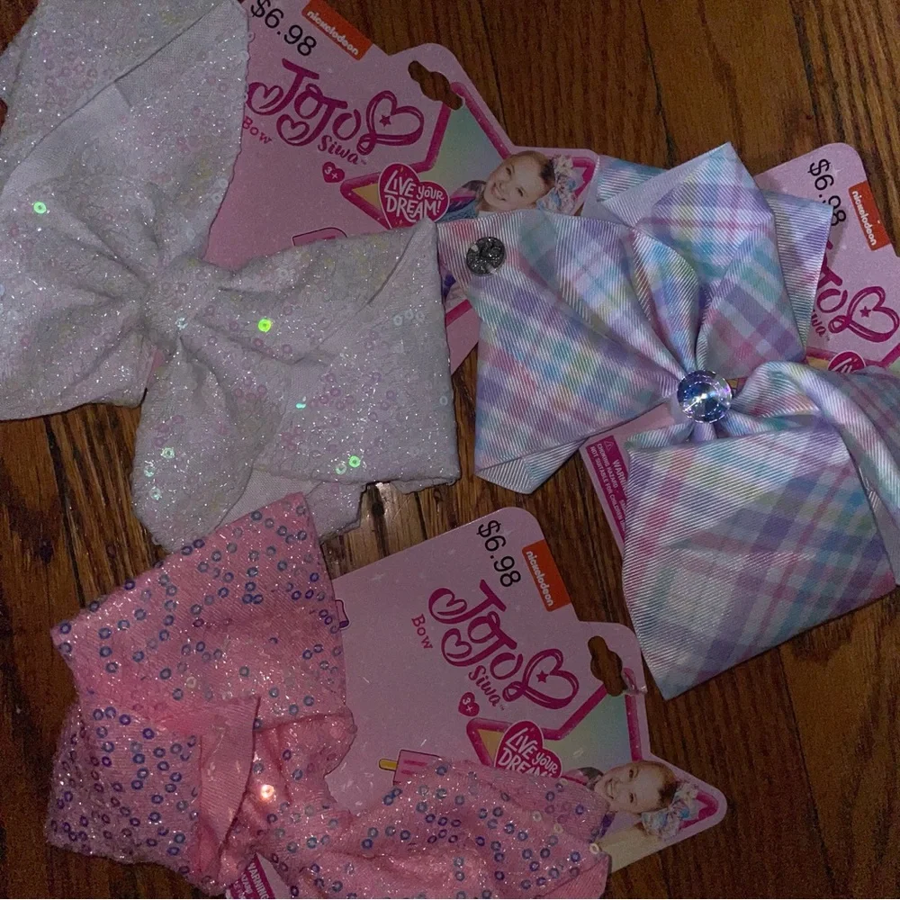 JoJo Siwa three playful
