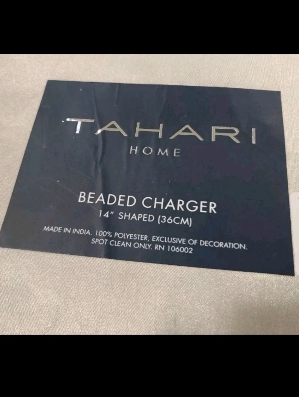 Tahari new sticker