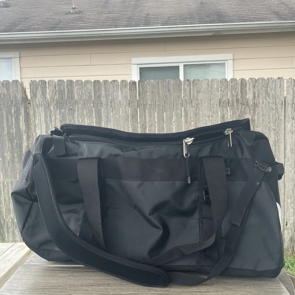 The North Face Black Duffel Bag with White Logo