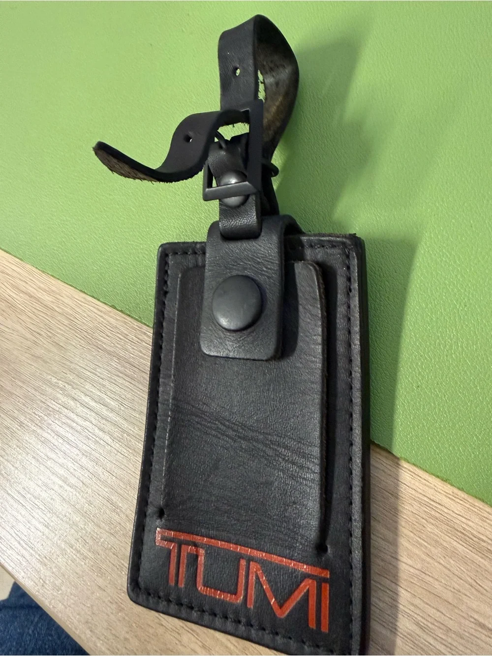 Tumi Black Leather Luggage Tag with Orange Logo