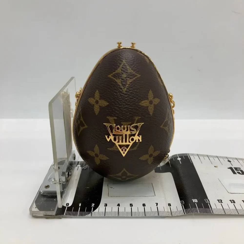 6056 - Louis Vuitton Cross Body Mini Monogram Egg Case