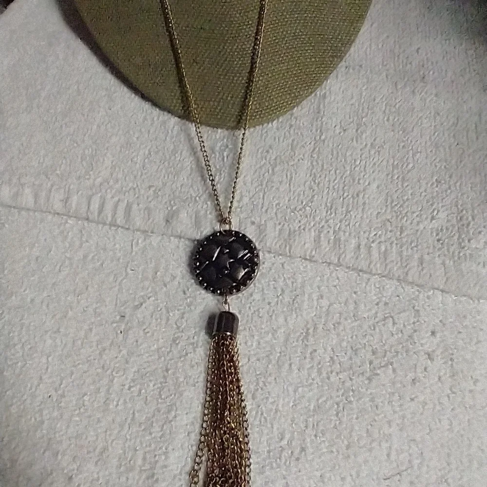 Long goldtone tassel coin chain necklace