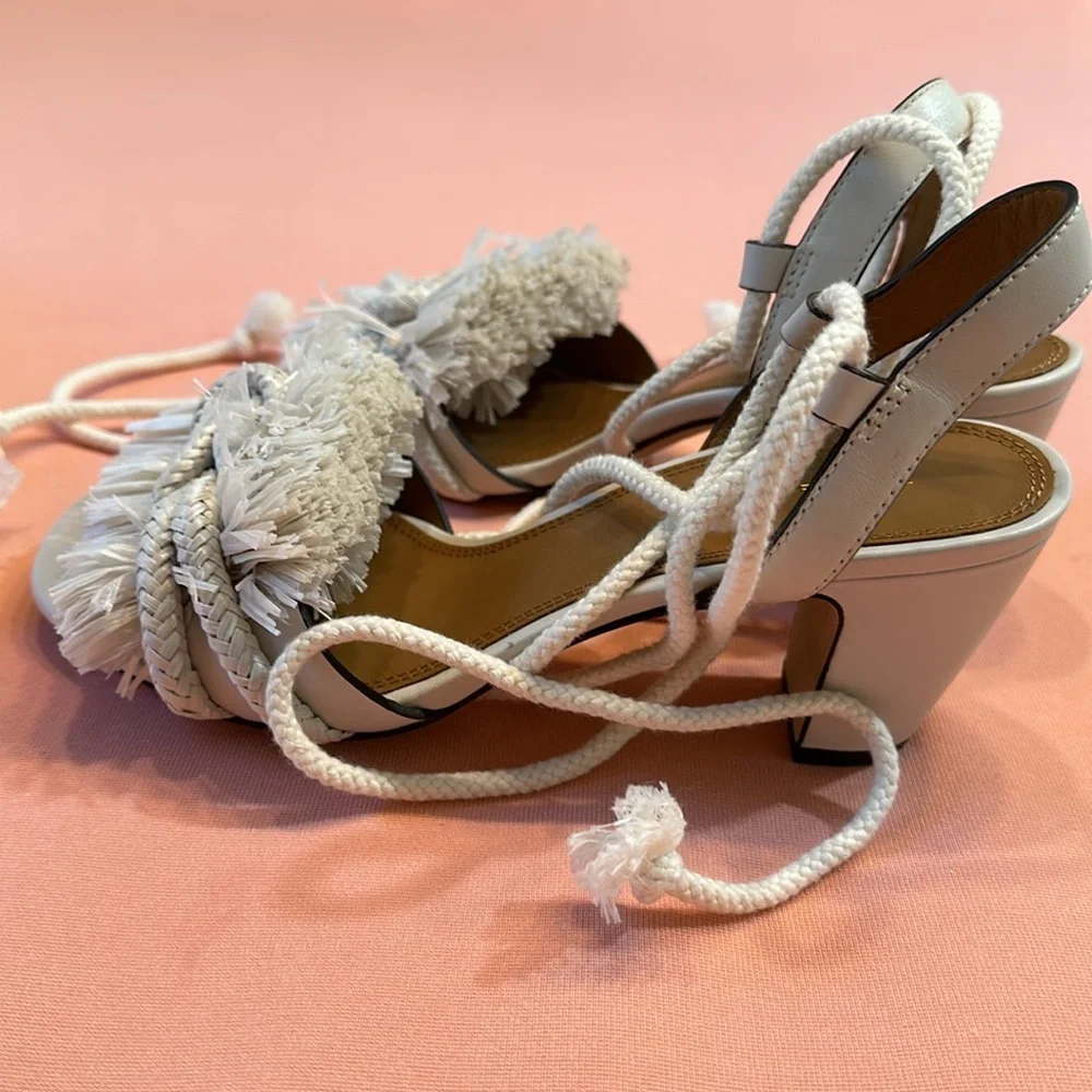 Tory Burch includes white knot