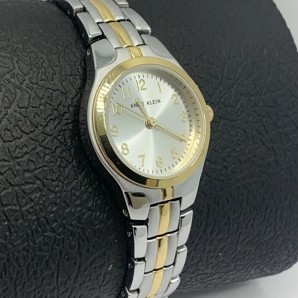 Anne Klein 10-5491SVTT Women's Stainless Steel Analog Silver Dial Watch MGK19