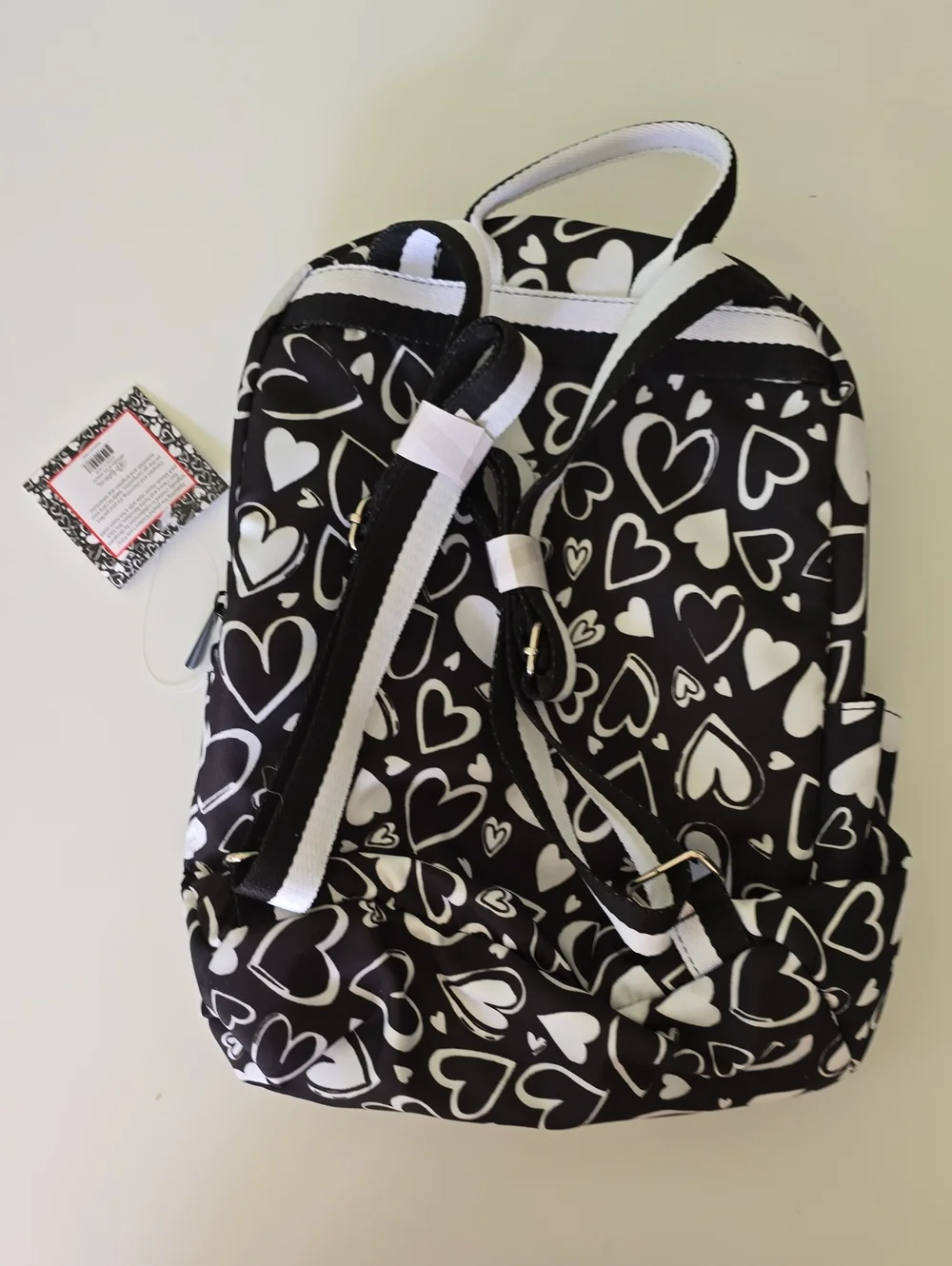 Brighton Kids Endless Love Back Pack. Black With White Heart Prints.