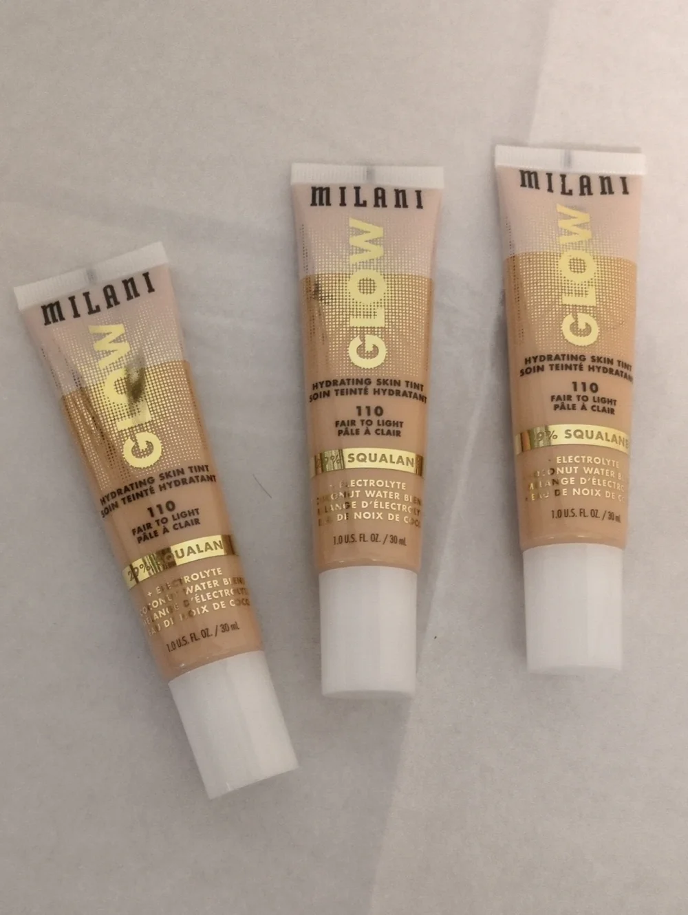 Milani GLOW Hydrating Skin Tint 110 Fair to Light - Nude Beige Tubes