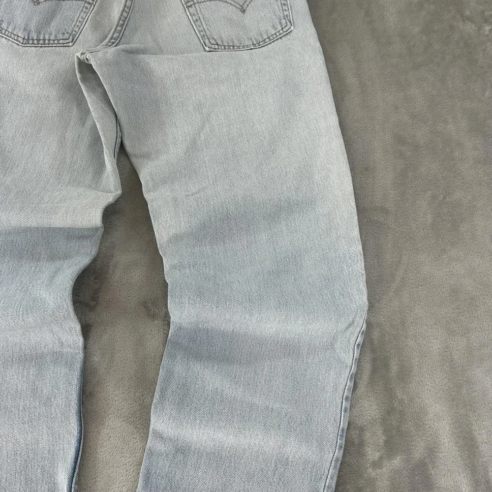 Levi's 550 Jeans Mens 28x30 Blue Light Wash Relaxed Tapered Distressed Denim