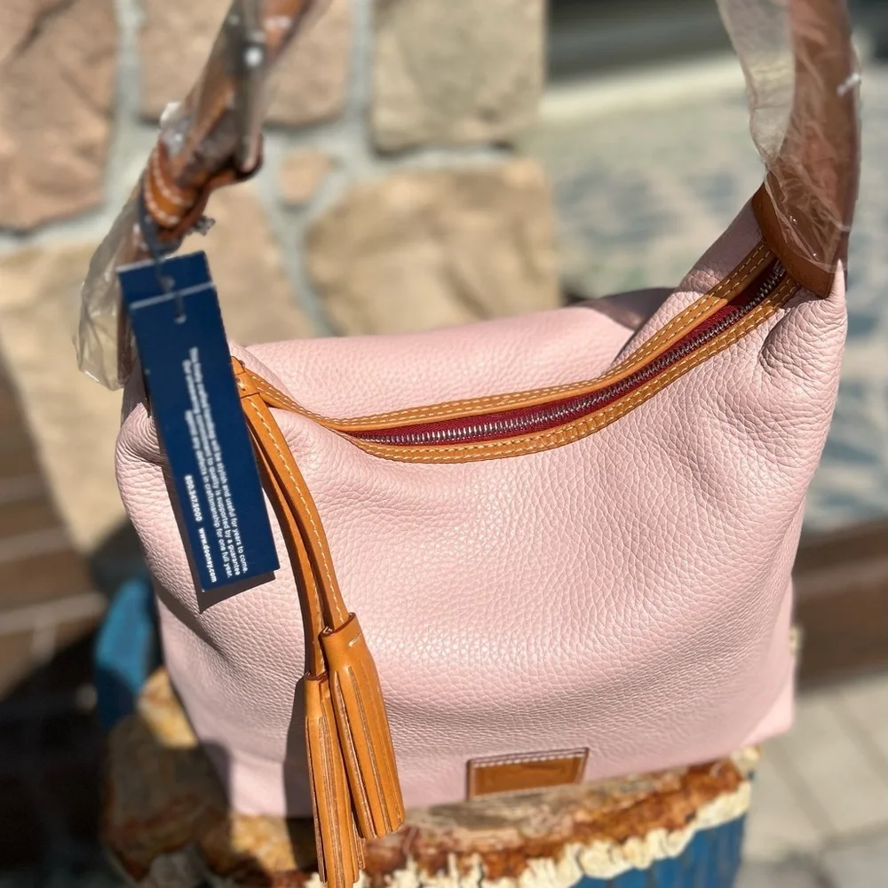 Dooney & Bourke blush 11” more
