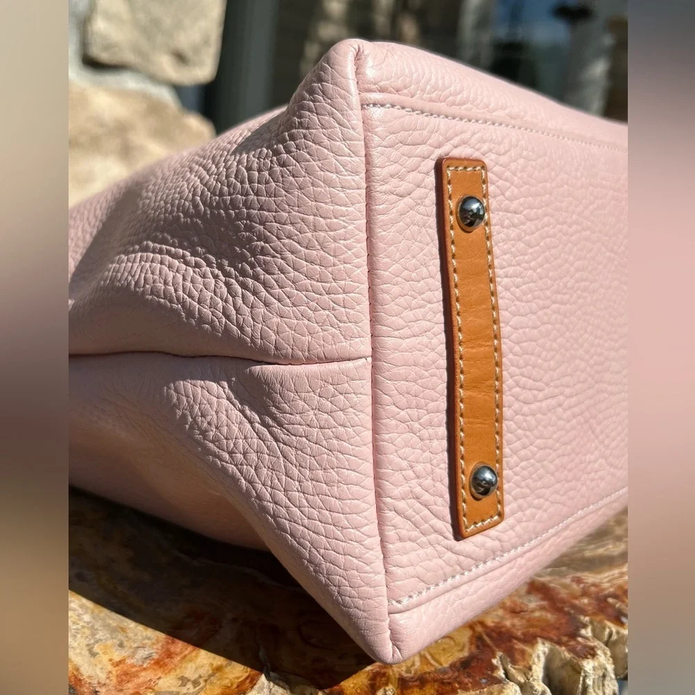 Dooney & Bourke repellency see
