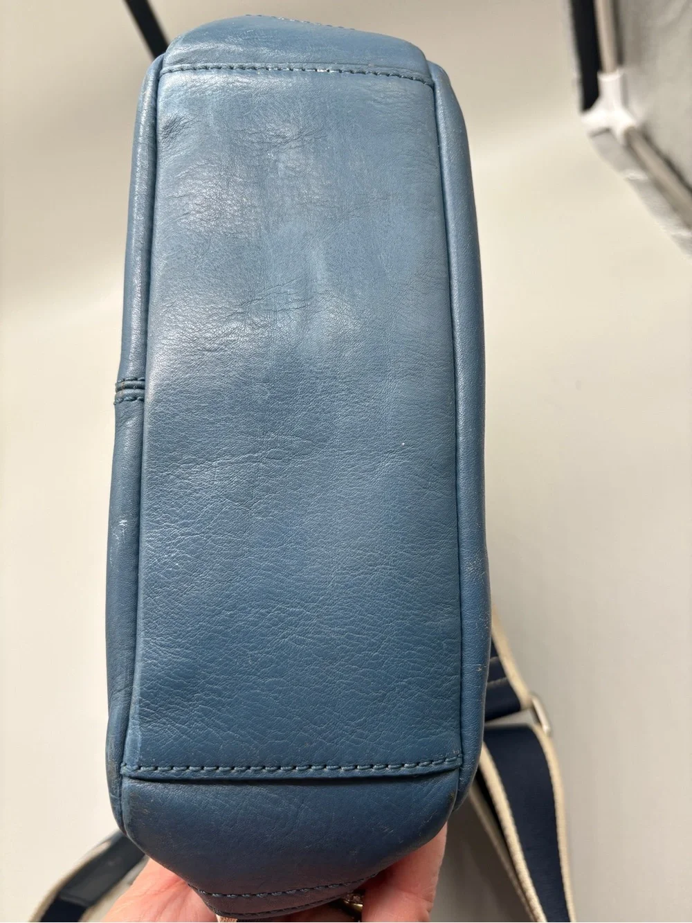 Coach logo embossing