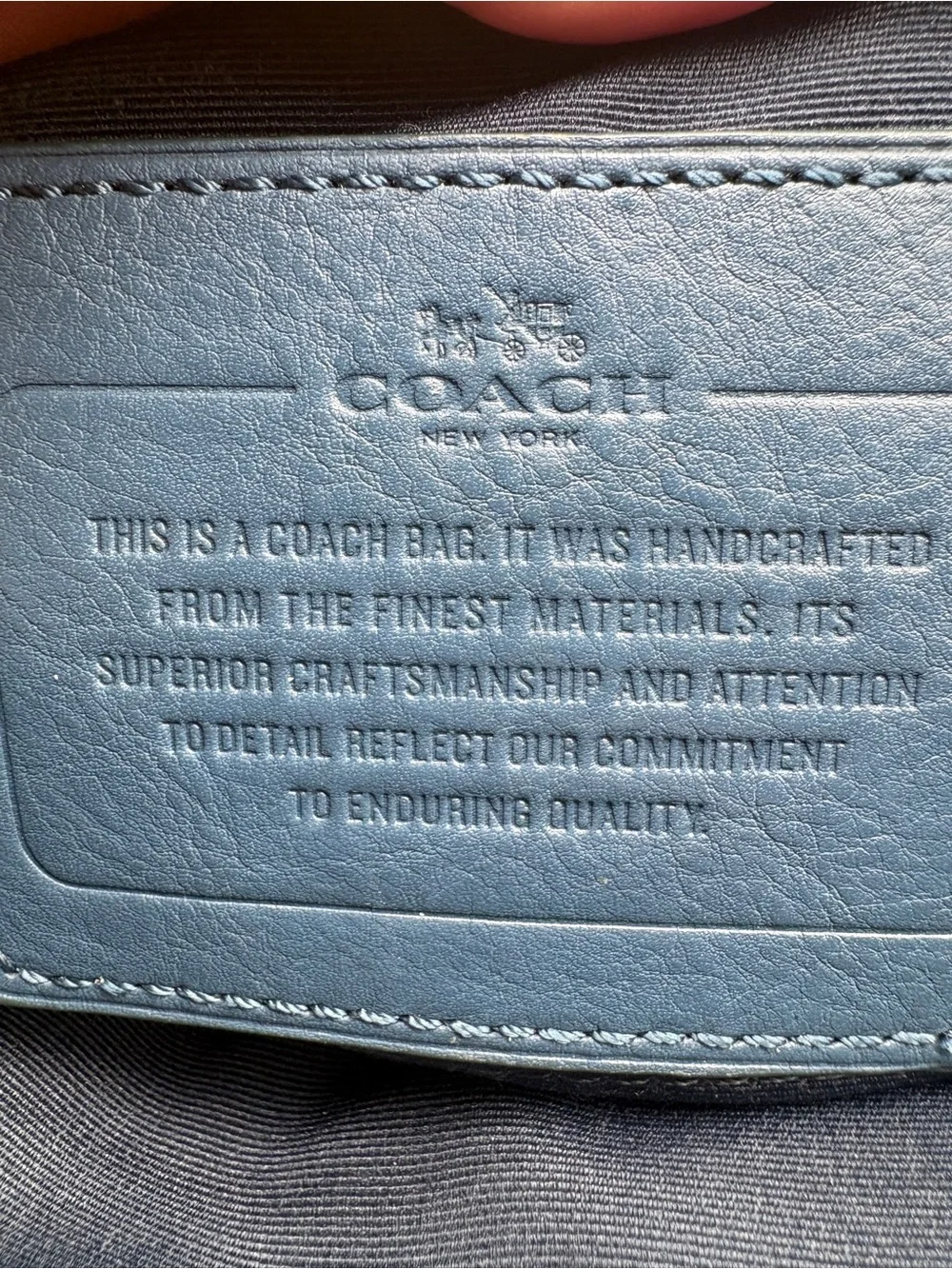 Coach logo embossing