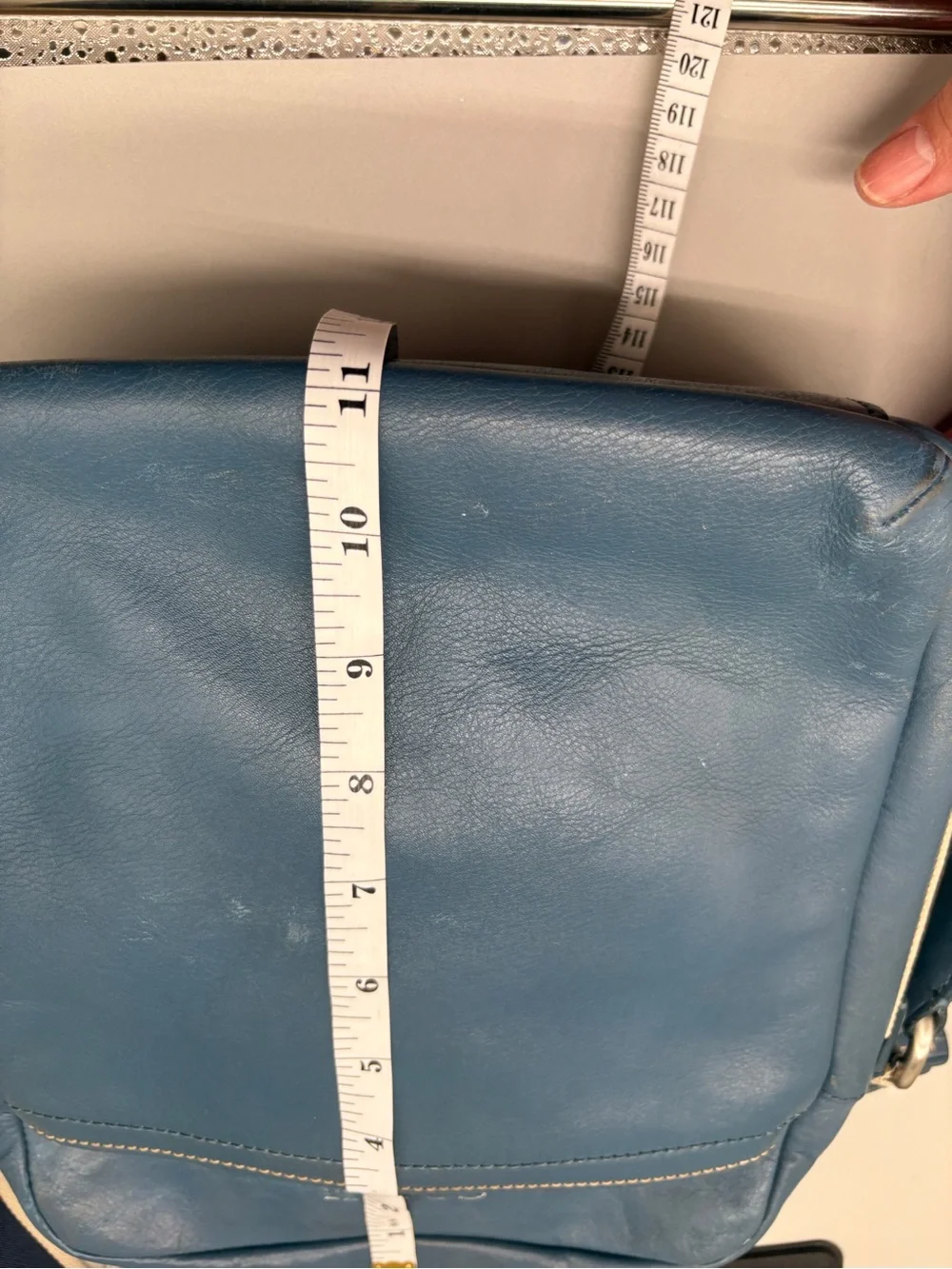 Coach logo embossing