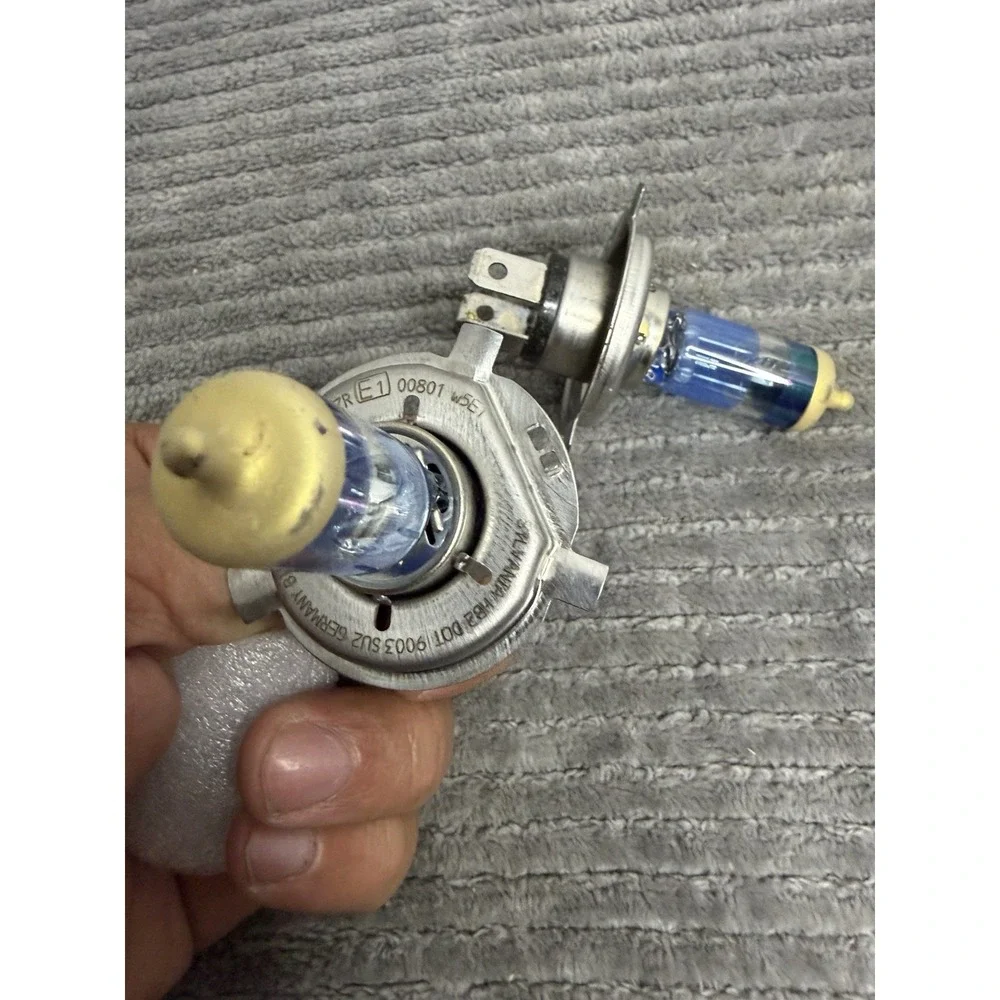 H4 12V 60/55W halogen headlight bulb.
