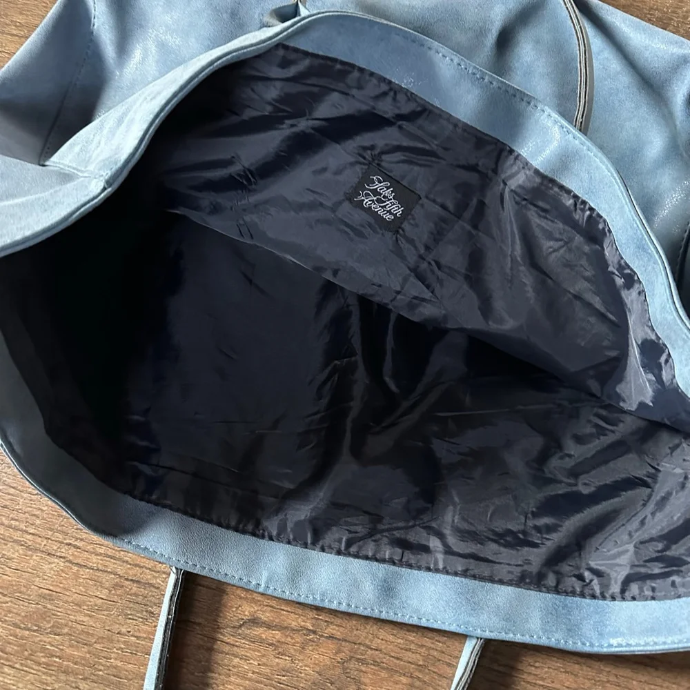 Saks Fifth Avenue pre tote about