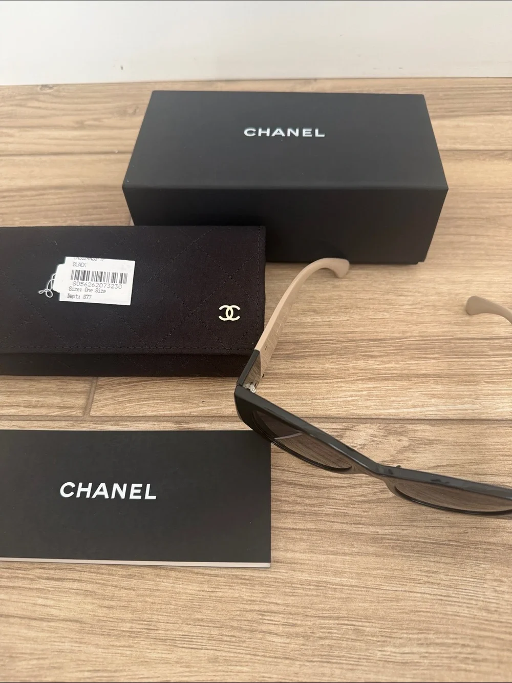 CHANEL Black Cat-Eye Sunglasses with Beige Temple Accents