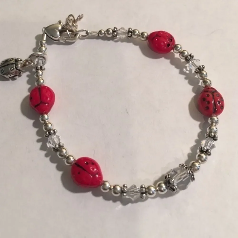 Sterling‎ ladybug bracelet with heart clasp