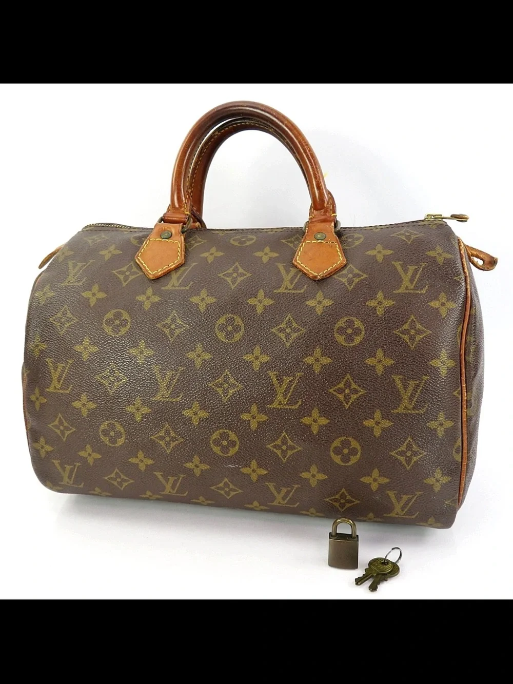 Louis Vuitton Brown Monogram Duffel Bag with Vachetta Trim