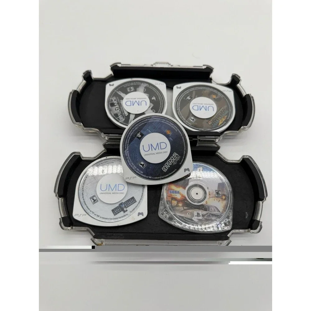 Lot of 5 PSP games with Hard Case Holder.  Not Tested, Working When Last Used.