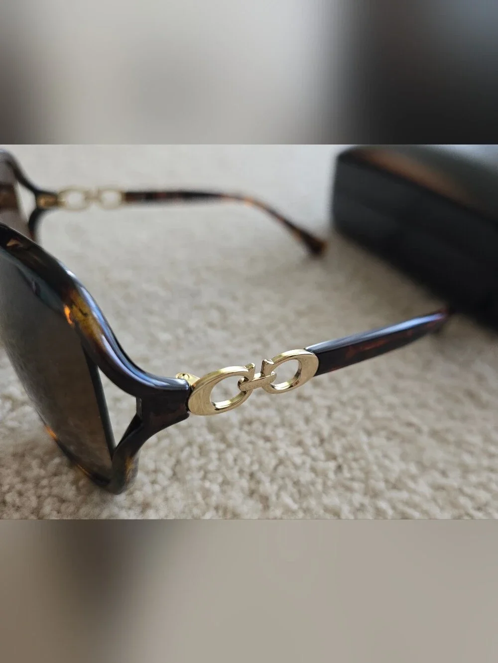 Coach sunglasses look polished