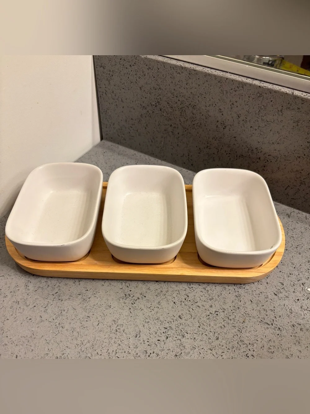 Crate & Barrel White Ceramic Triple Serving Dish on Bamboo Tray