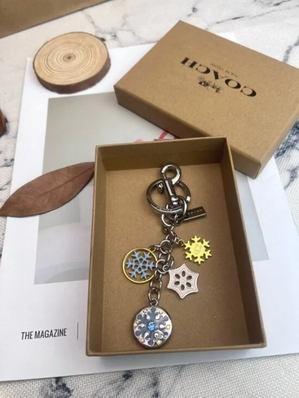 Coach keychain featuring