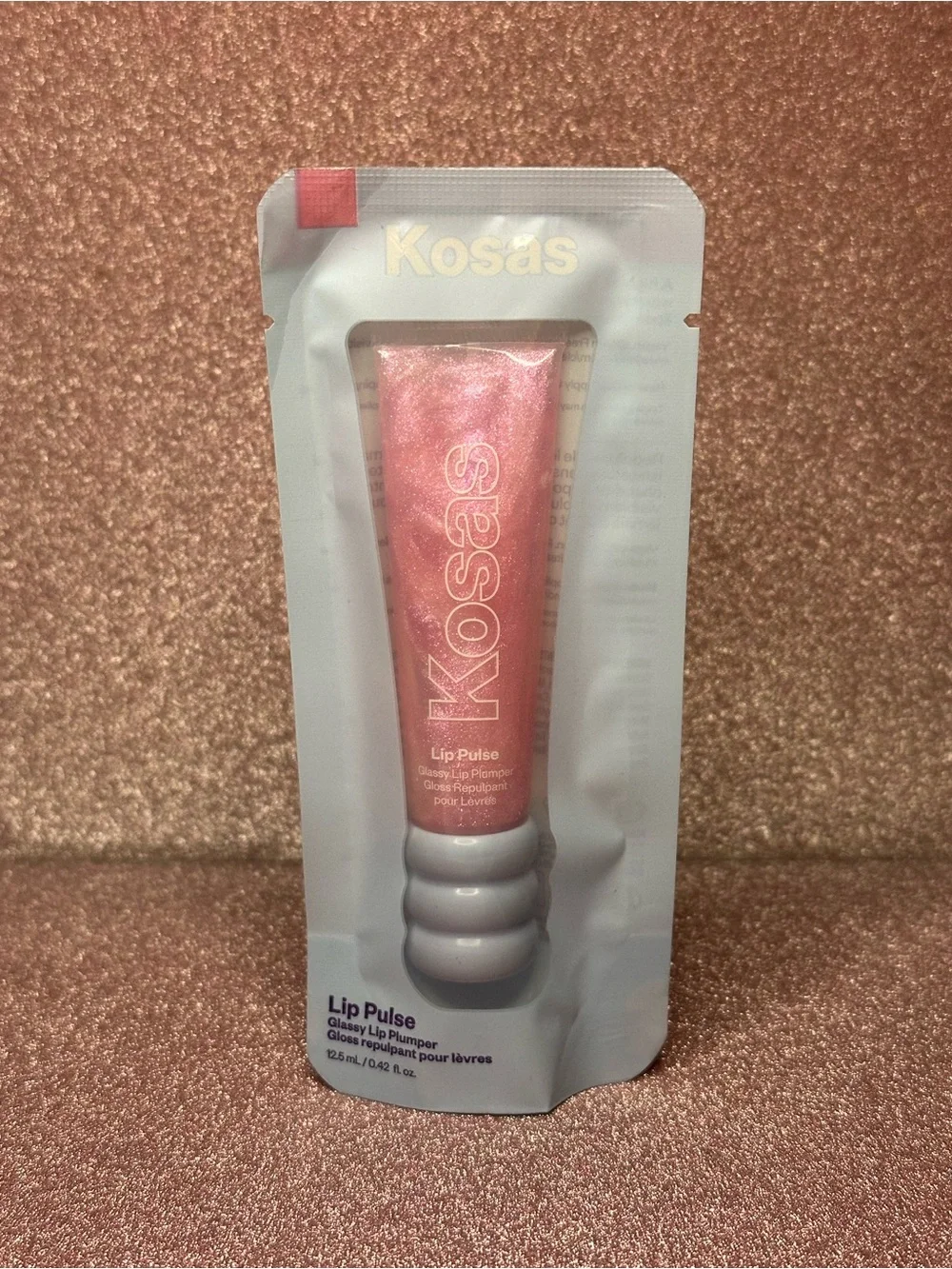 Kosas Lip Pulse Plumper in Aura Flare