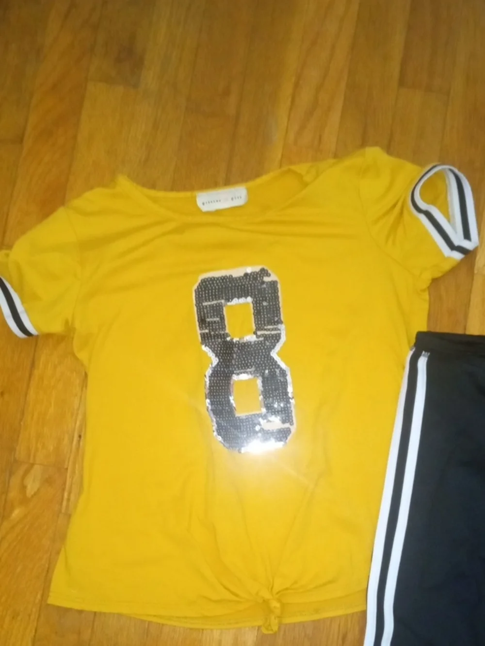 girl 14 adidas drifit leggings and yellow sequin tee