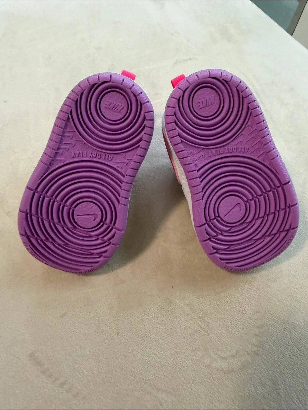 Nike Toddler White Sneakers with Pink & Purple Accents