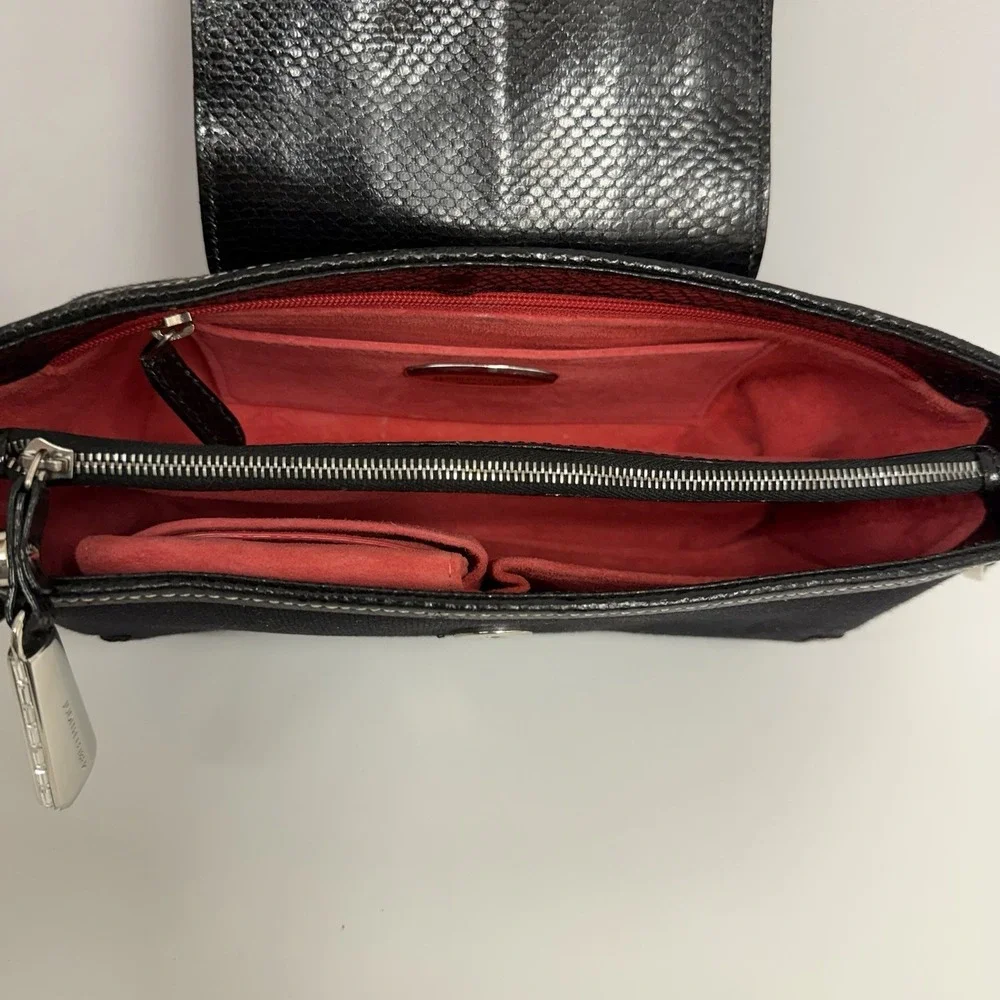 Judith Leiber black snakeskin